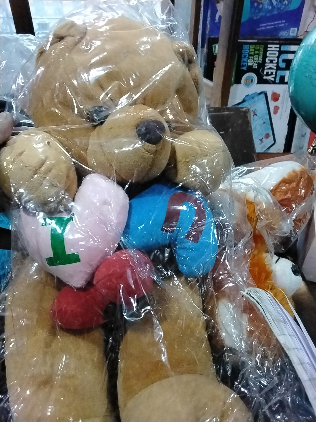 refurbished  brown teddy with hearts